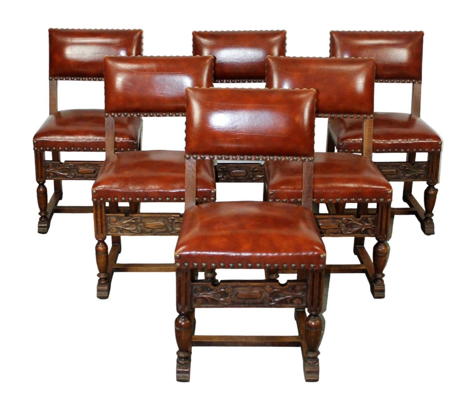 6 French carved oak and leather dining chairs